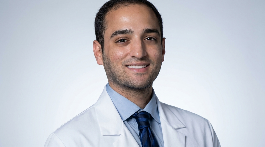 Dr. Ryan Chaliff, DDS, MD, practicing dentist and co-founder of BRITEN, in a white coat