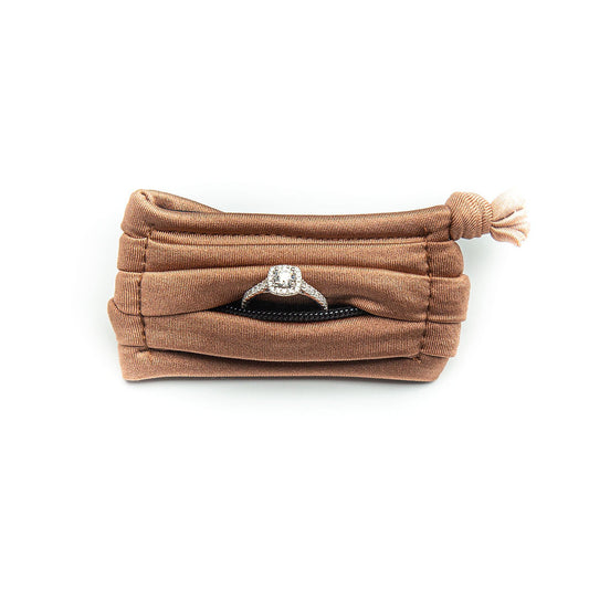 THE ORIGINAL RING BANDIT: THE GO ANYWHERE, DO ANYTHING BRACELET WITH A POCKET